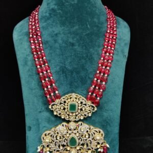 Shop Moissanite Red Beads Mala Pendant by 925silvercharm – 22k gold plated 925 silver, radiant moissanite stones, and rich red beads for timeless elegance.